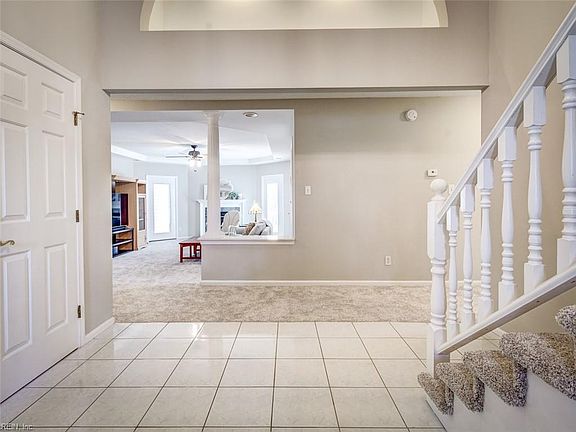entryway with a coat closet