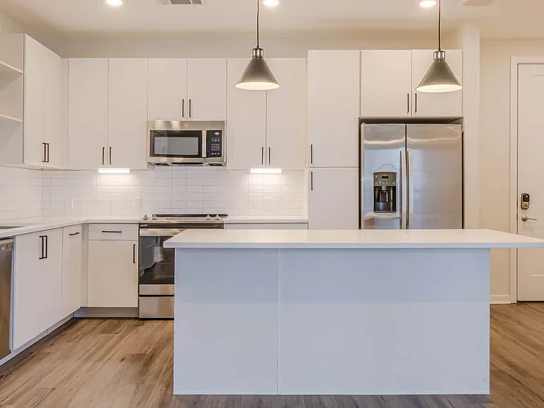 Kitchen with Stainless Steel Appliances and Light Cabinets