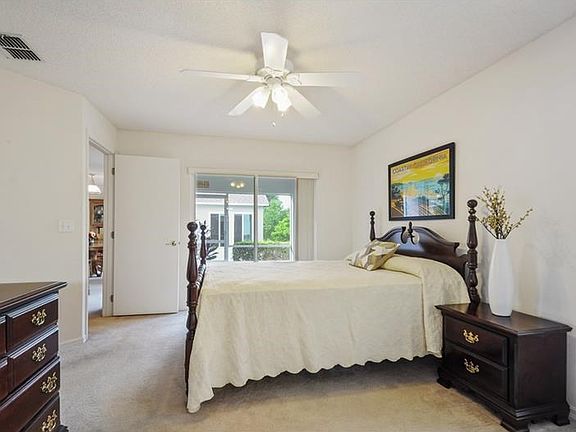 Owner's Bedroom has great natural lights and access to Screened Patio