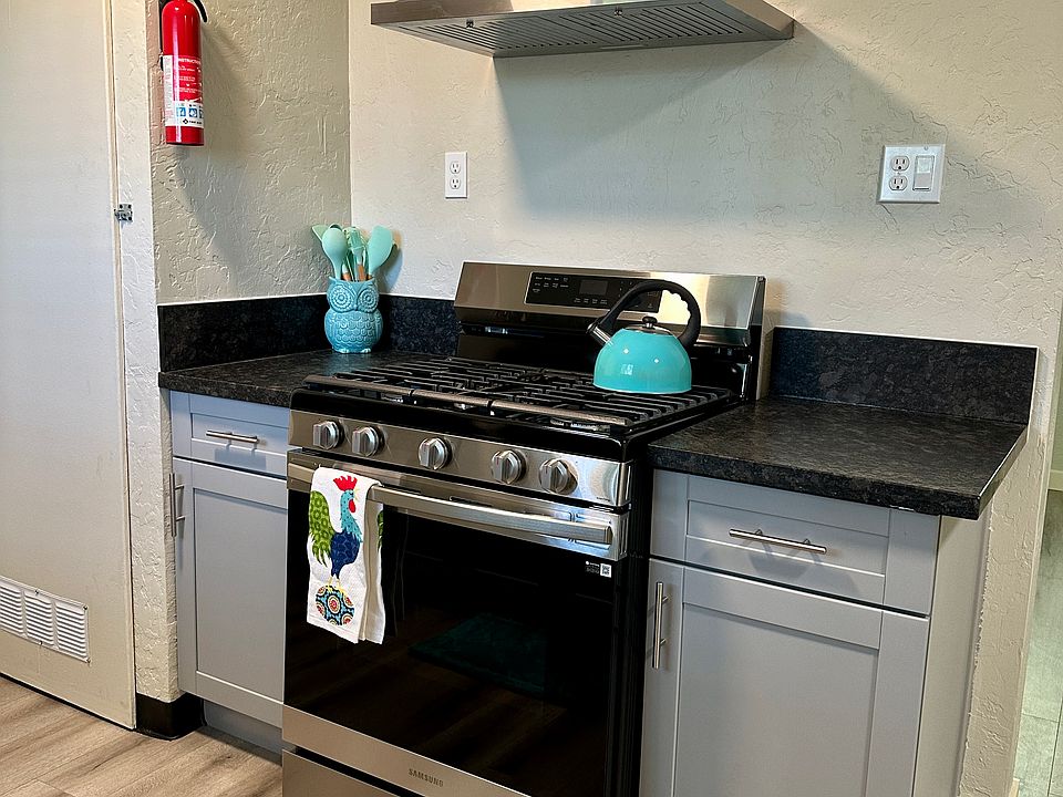 Stove top has an attachment for a center griddle, and has a self cleaning oven. The exhaust fan also is lighted using LED.