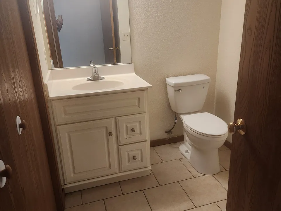 Half Bathroom downstairs in entry hallway