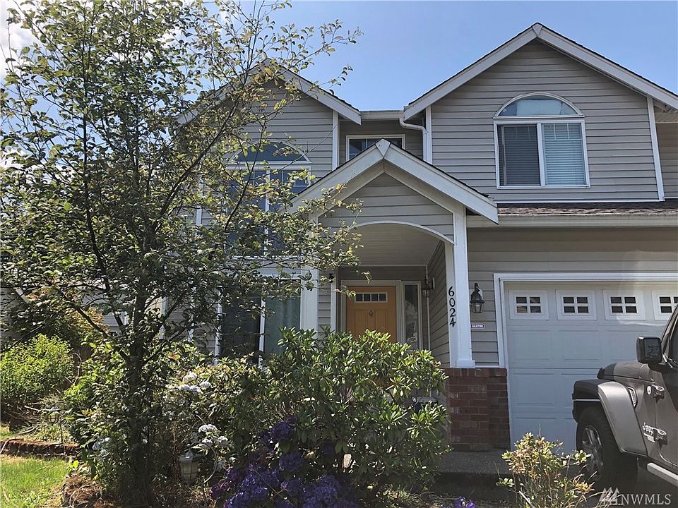 Great home and great location.   The bright and cheery entry way door invites you in. A green thumb can really make the yard and flower beds shine. 