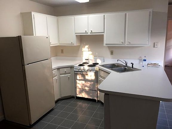 Open kitchen. Washer under cabinet