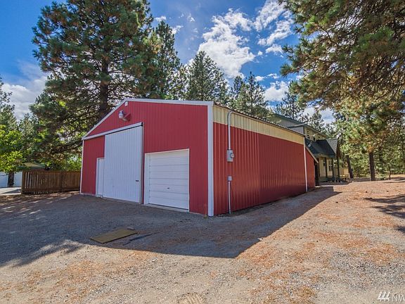 Shop is approximately 1100 square feet.  Inside you'll find storage room, storage loft, work bench and the giant wood burning stove (aka The Beast).