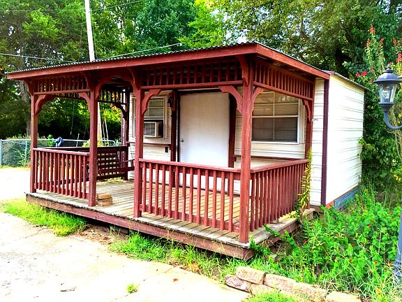 Shed with porch and a patio!