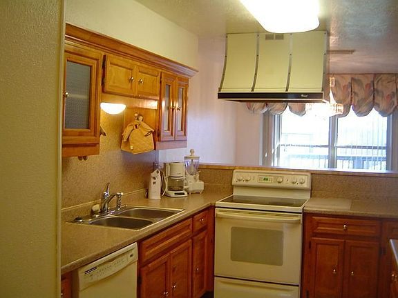 Spacious sunny kitchen area with upgrades