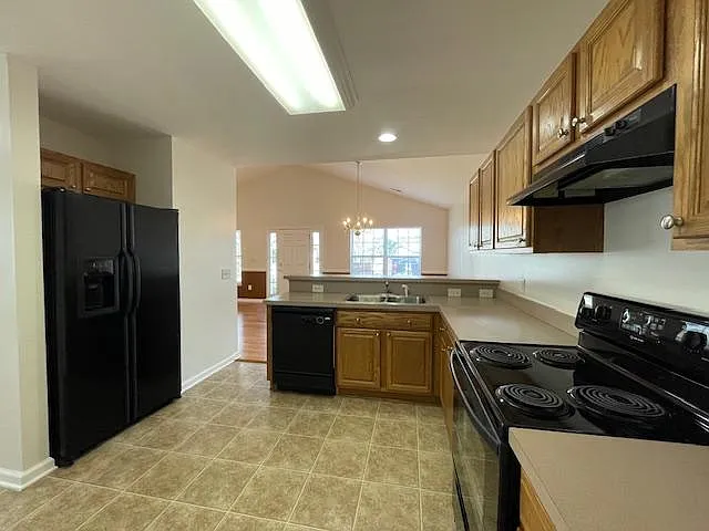 Fully equipped kitchen includes garbage disposal.