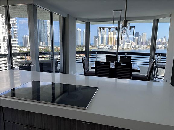 5th image of 3600 Mystic Pointe Dr APT Lph13