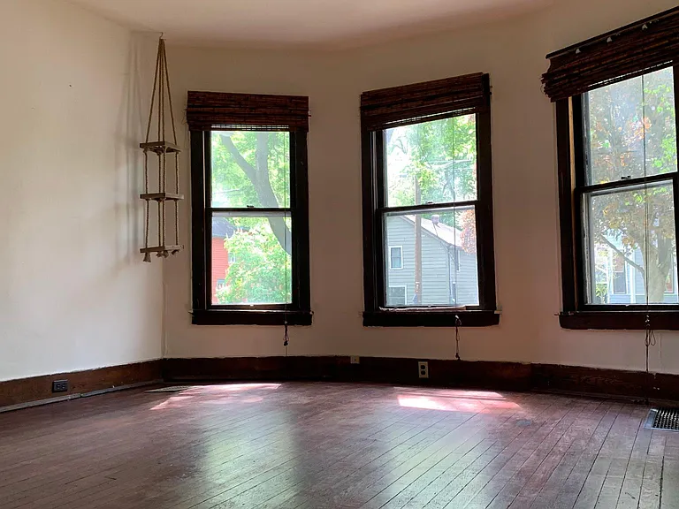 Spacious living room with bay windows