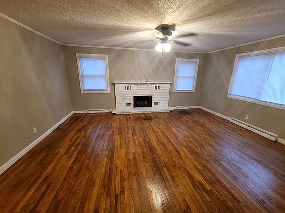 living room, decorative fireplace with electric fireplace