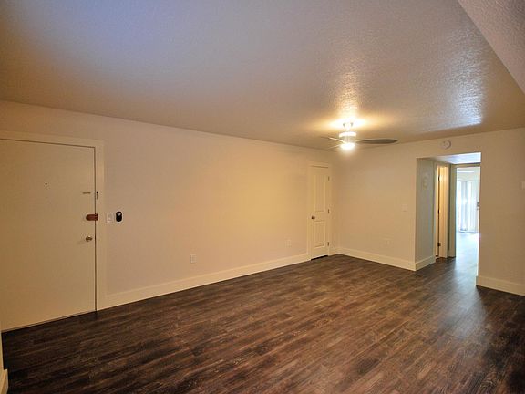 Living Room with front door and coat closet