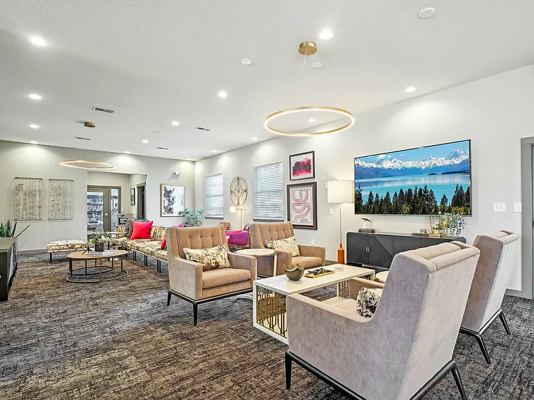 Relax in a stylish resident lounge with modern decor and comfortable seating at The Preserve Murfreesboro.
