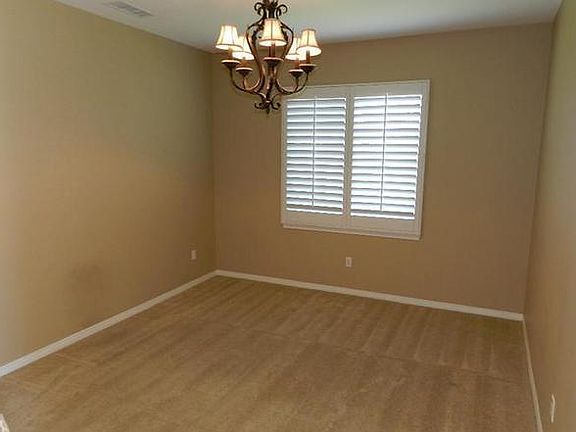 Dining room. Flooring is hardwood.