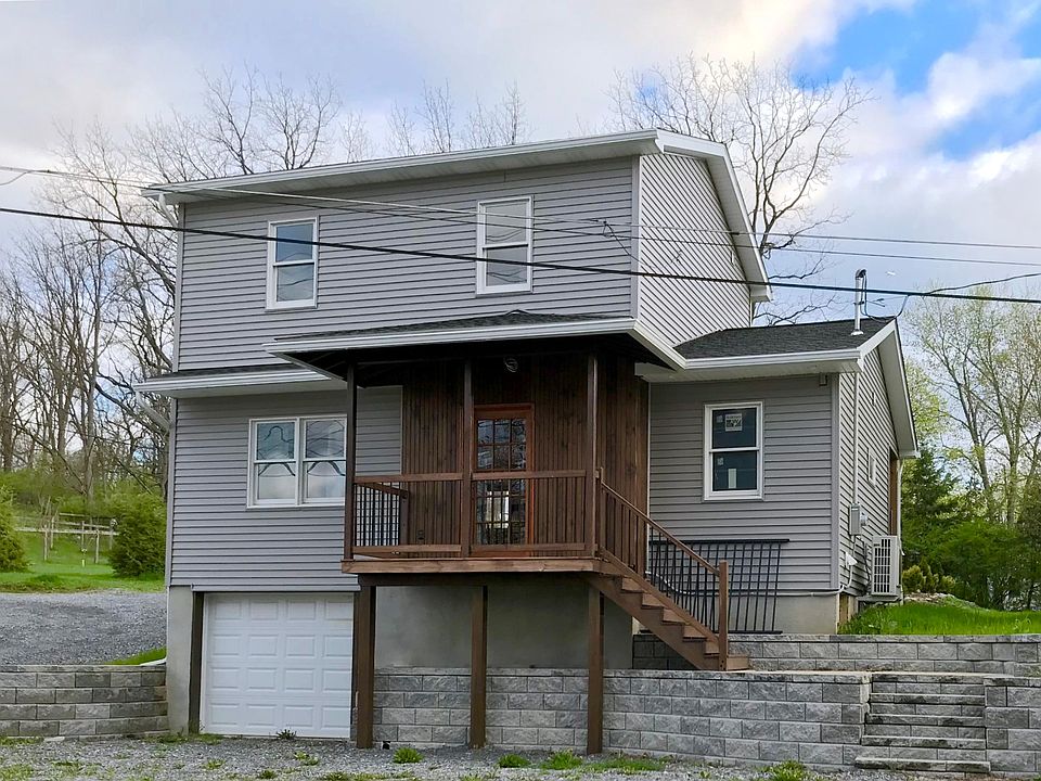 Front of house with walk-out basement.