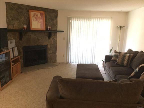 Living room w/access to deck