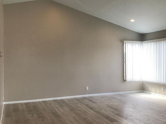 Cathedral ceiling living room. LED lightings