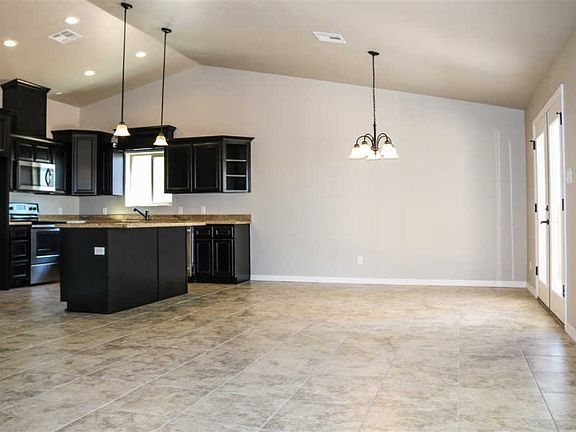 5th image of 8641 E 35th Pl