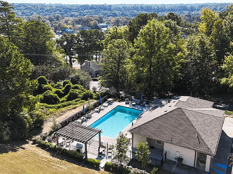 Surrounded by Mature Trees and Landscaping