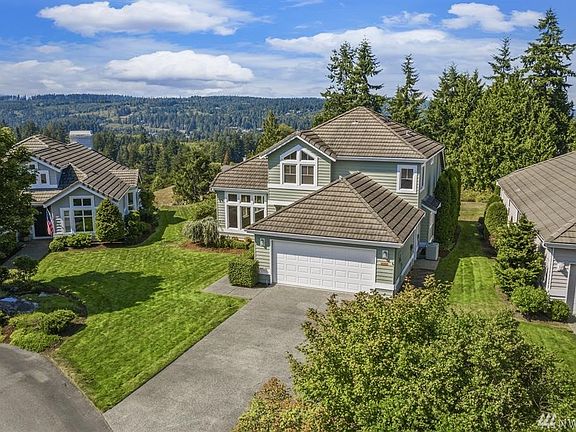 This home enjoys a beautiful setting; with a peek-a-boo view of Puget Sound, as well as gorgeous territorial views and the Olympic Mountains beyond!