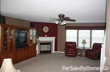 Family Room : Large family room that looks into kitchen. Fireplace can either be log or gas.