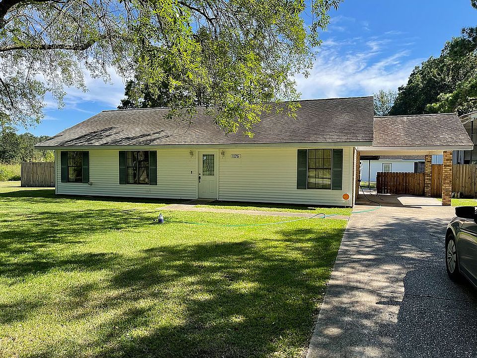 Brick home with vinyl front 