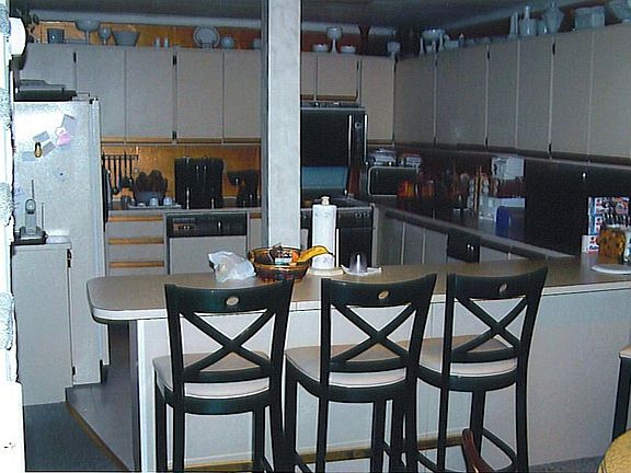 The kitchen in this home is a great place to congregate.