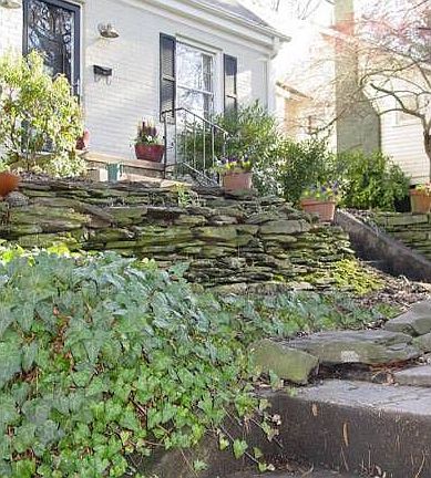 Stone planters in front