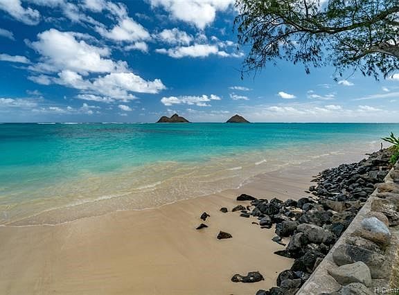 This gorgeous view of Lanikai Beach and the Mokulua Islands seen from the property's ocean front lawn.