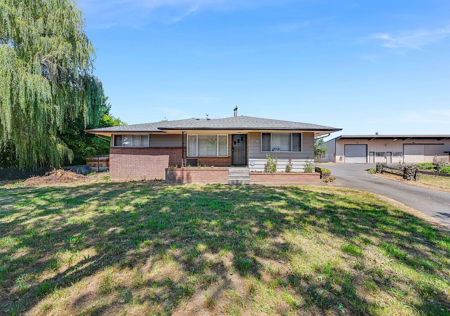 Rare 7-acre property - renovated 3 bed, 2 bath home, with powered barn! — Photo 2