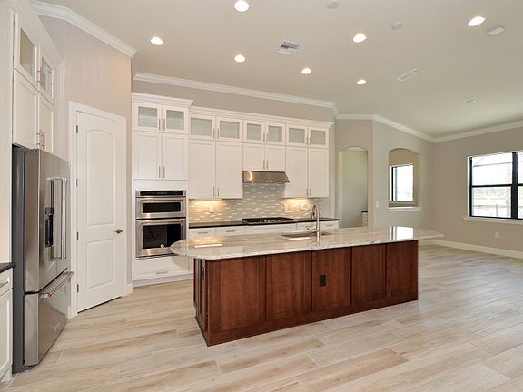 Model Representation Spacious Kitchen with stainless steel appliances