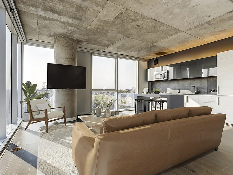 Model apartment living area and kitchen