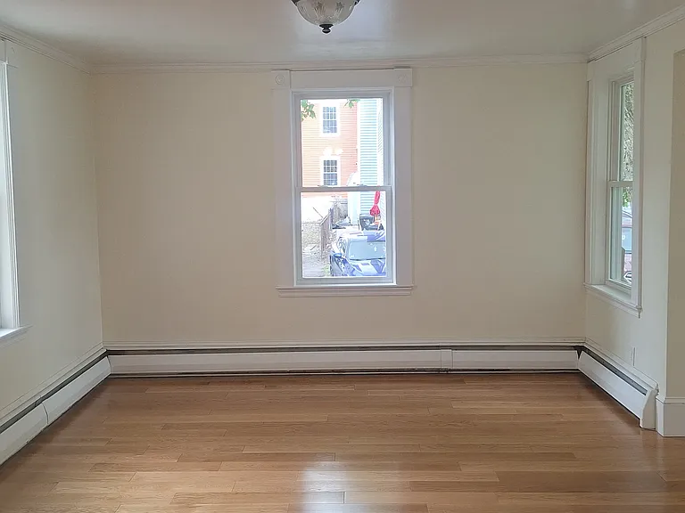 Large livingroom with new wood flooring