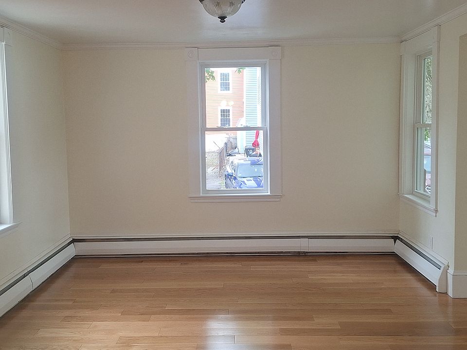 Large livingroom with new wood flooring