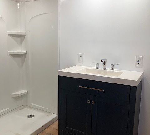 Updated bath with a walk in shower