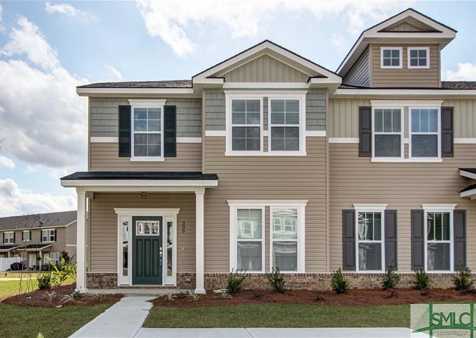 Desirable end unit with double parking pad