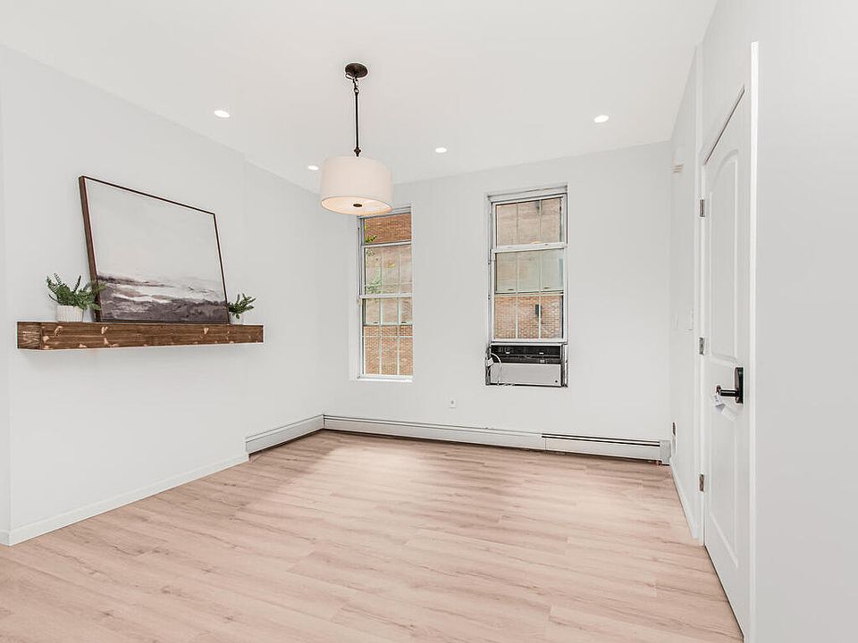 Bright and spacious living room can also be used as a second bedroom!