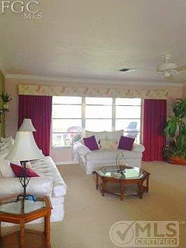 Featuring a Large open and bright living room with Waterfront views.