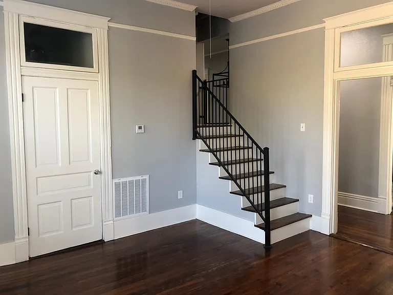 Huge upstairs bedroom & bath with shower and soaking tub accessed from main level stairway in study.