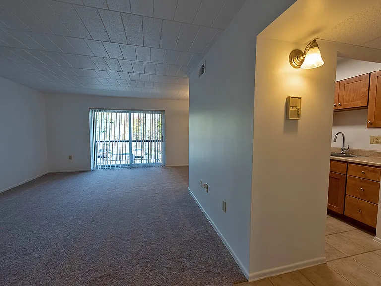 View from hall towards living area and kitchen