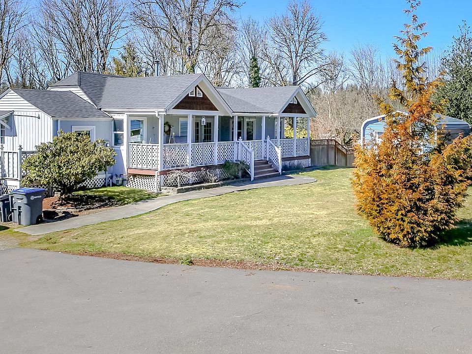 Rambler home with unfinished basement. Detached single car garage.