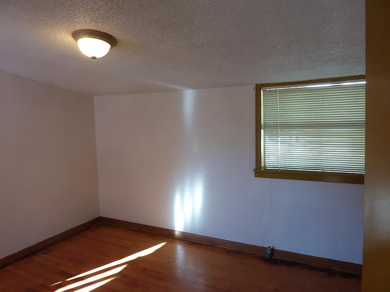 Bedroom, hardwood floor.