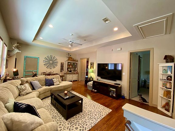 View from top of the stairs into living room