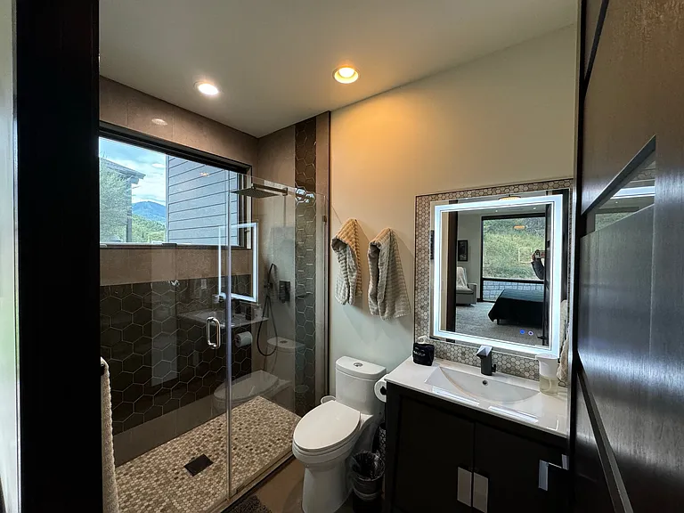 Bed 2: (upper left) bathroom