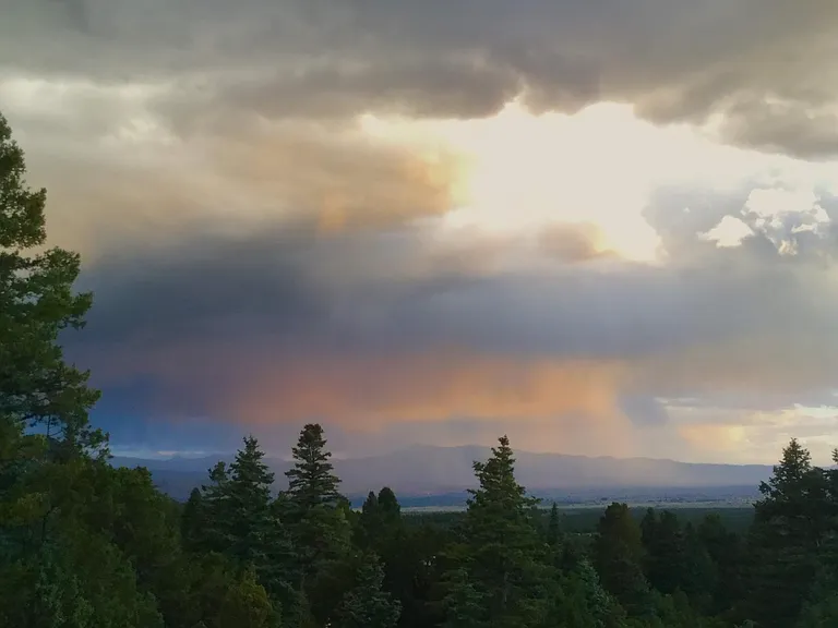 Rain cloud at sunset