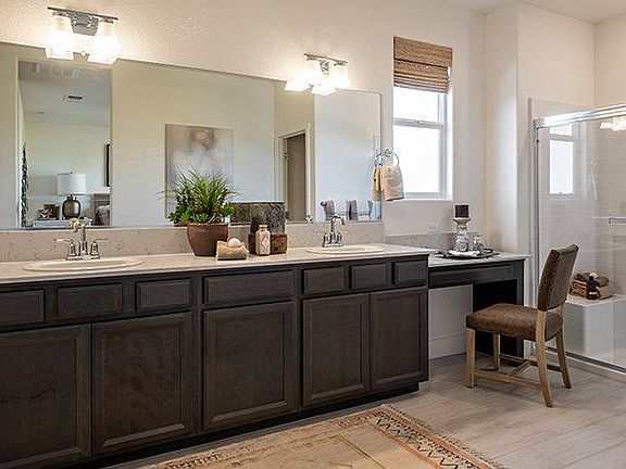 Master bath with double sinks and vanity