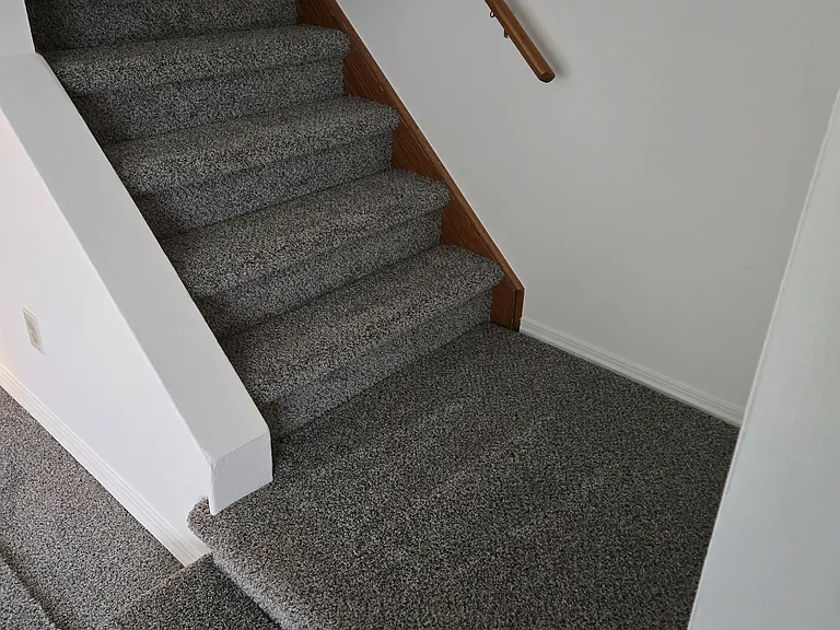 Stairs to 2nd floor viewed from Living Room.