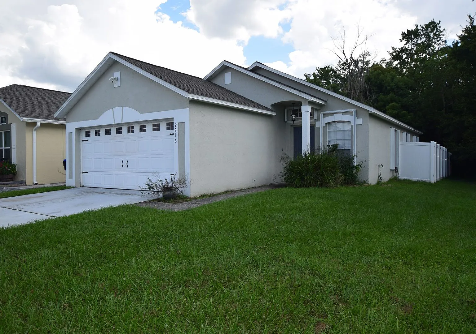 This charming 3 Bedroom, 2 Bath Single Family Home For Rent at 2216 Phonecia Ct. Orlando, FL 32837 — Photo 1
