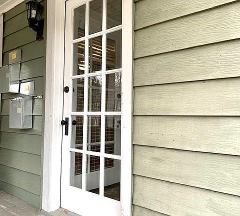Front door entrance to both downstairs and upstairs apartments.