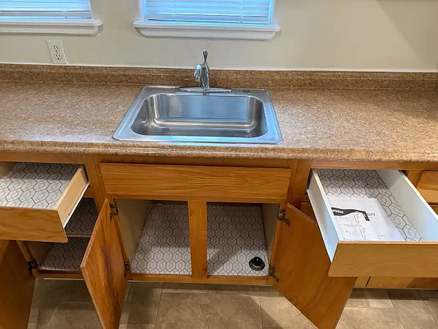 We added new lining for drawers and shelves