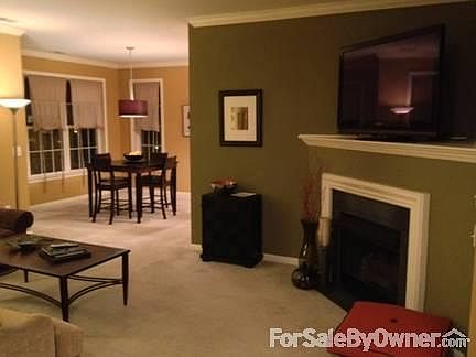 Living Room and Dining Room
						:
						Spacious living room w/gas fireplace w/slate surround. Large windows throughout